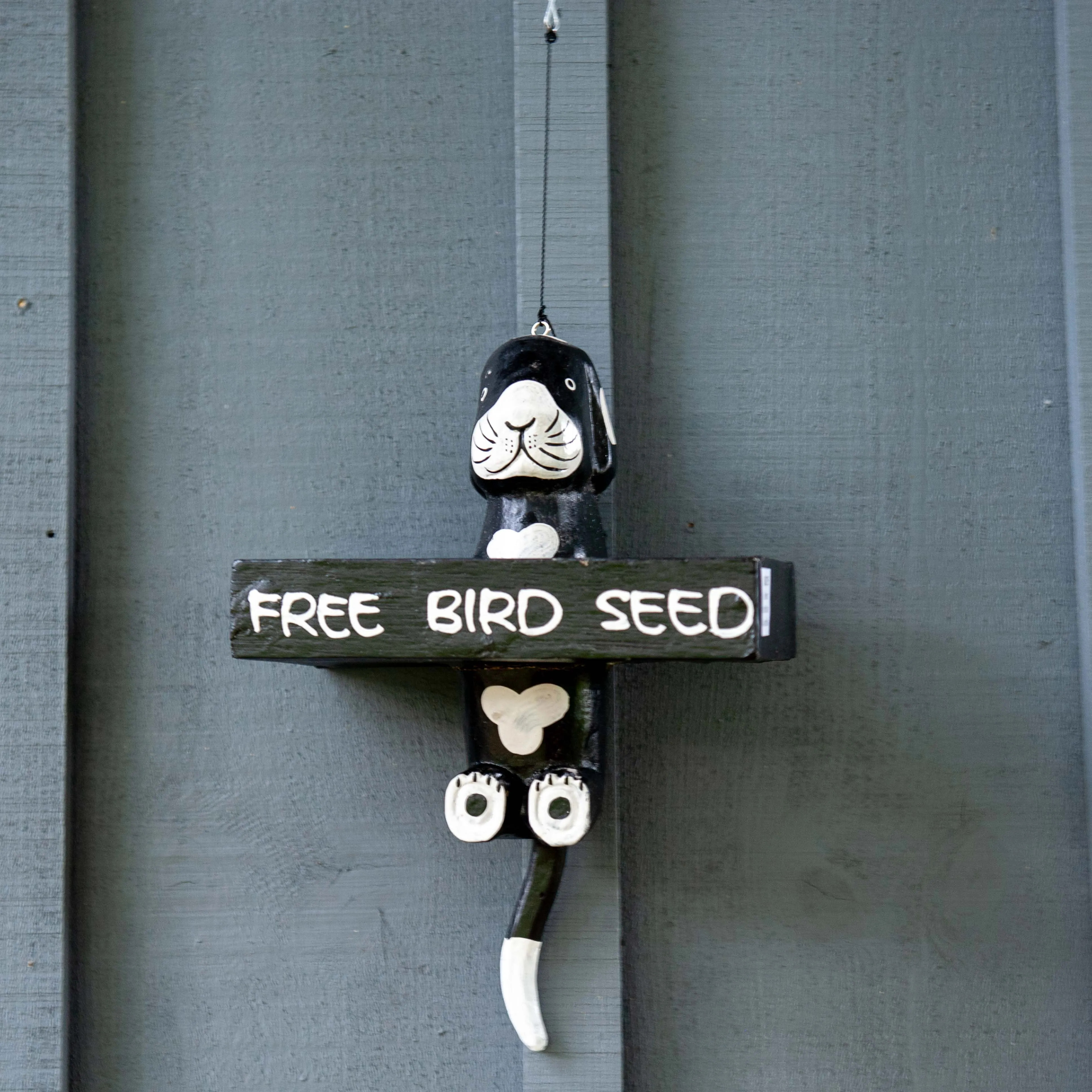 Balinese Dog Bird Feeder